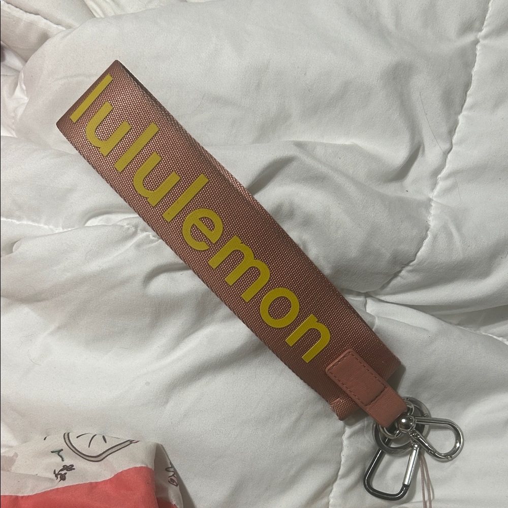 lululemon athletica used pink and yellow Key Holder with Yellow Logo